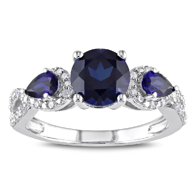 gemstone ring for men -Miadora Sterling Silver Created Sapphire and 1/6ct TDW Diamond 3-Stone Crossover Ring